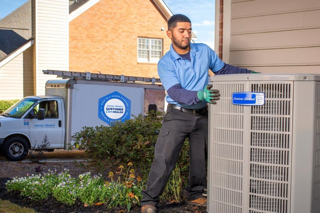 American Standard Tech installing AC unit